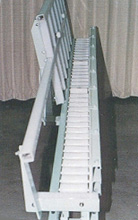 Transport conveyor for automotive parts