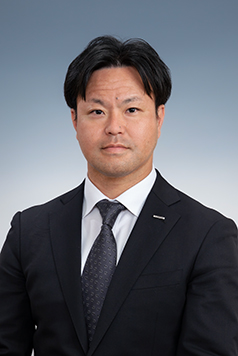 関　健成